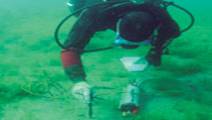Diver collects water samples