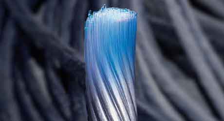 Image of steel cable turning into fibre optic wire