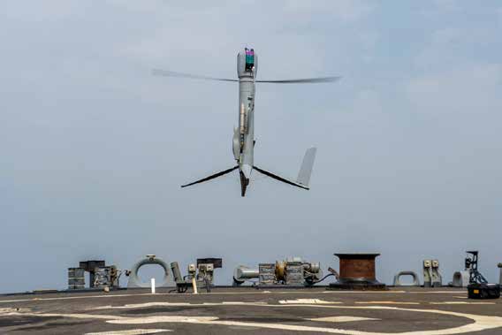 FlexRotor drone – a metal cylinder in the air with rotor blades spinning to keep it airborne. FlexRotor drone – a metal cylinder in the air with rotor blades spinning to keep it airborne.